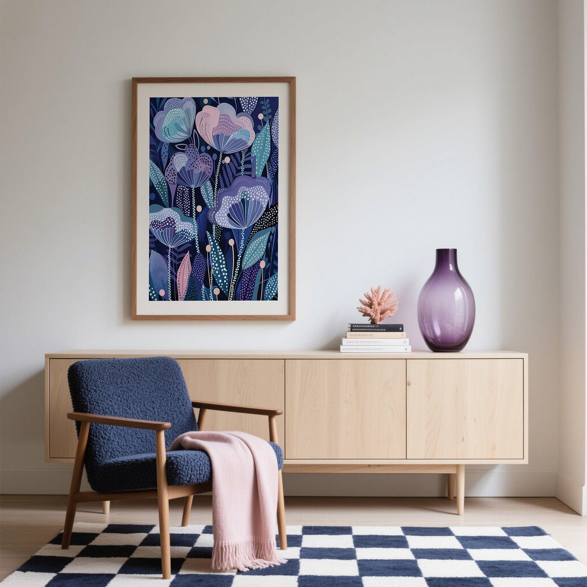 Purple flower poster in a wooden frame on a wall with a purple vase on a sideboard