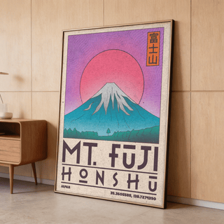 Mt Fuji Art Print leaning on the floor with a pink sun and blue mountain beside a wooden shelf