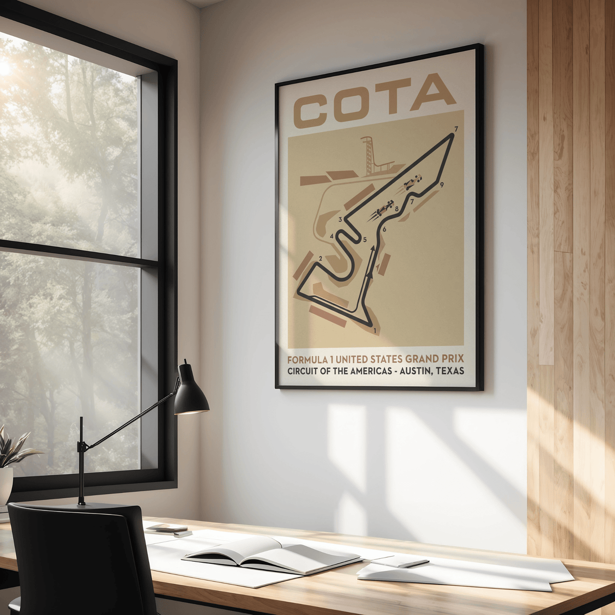 Race Track Map Poster framed print of a minimalist circuit map in browns and black above a desk in an office