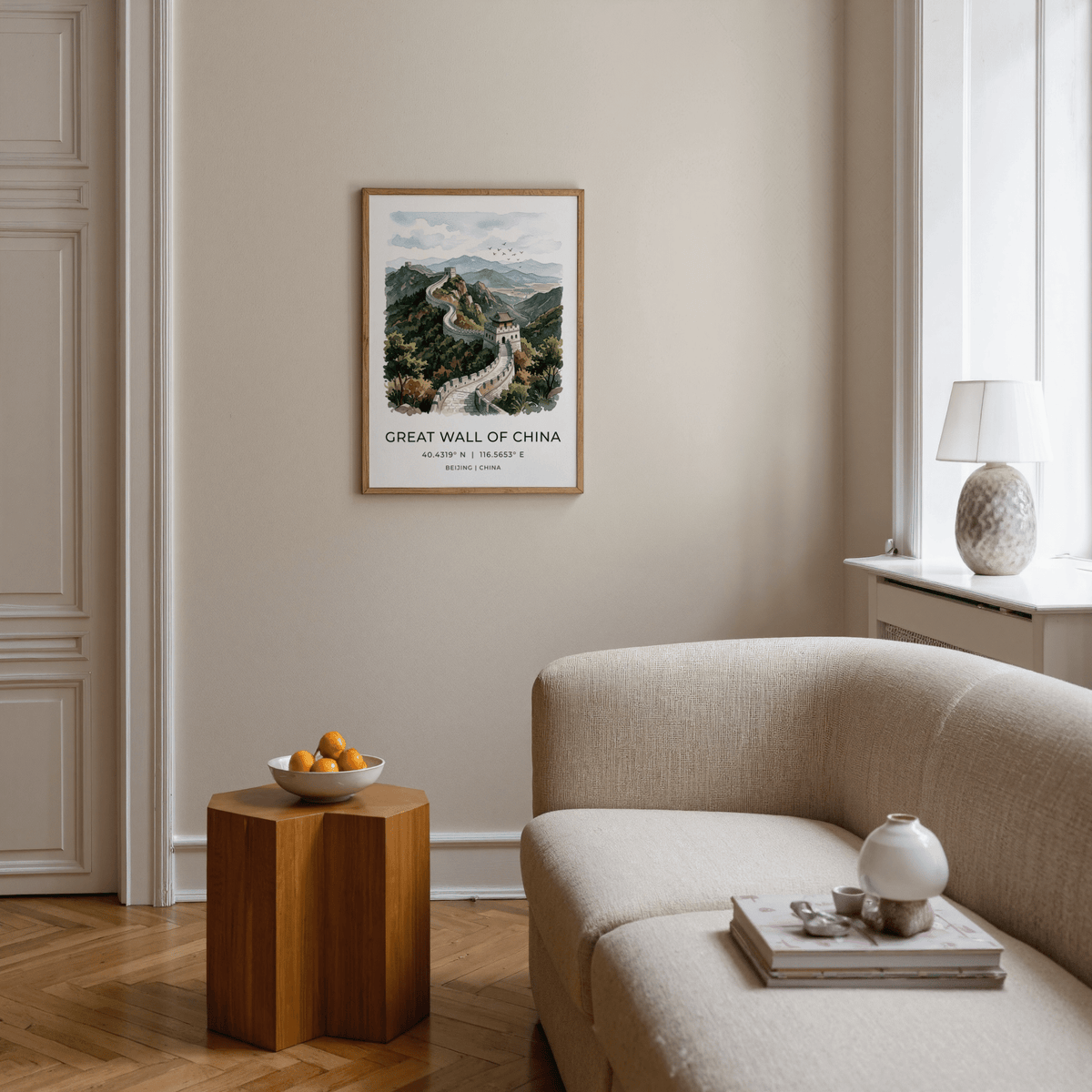 Great Wall Of China Art Print hanging above a wooden side table with a bowl of fruit in a living room