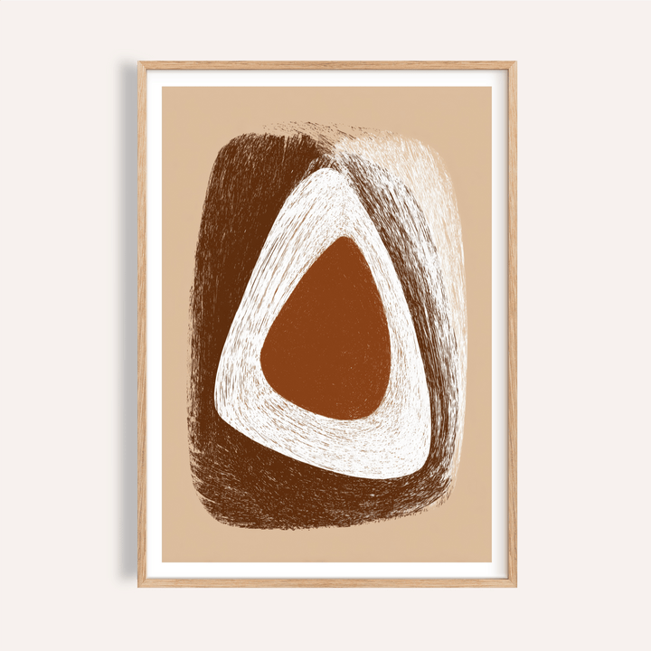 Framed abstract organic minimalist wall art in earth tones showing brown and white shapes