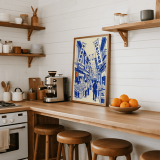 Japanese Market Art Print leaning on a kitchen counter with stools and a bowl of oranges