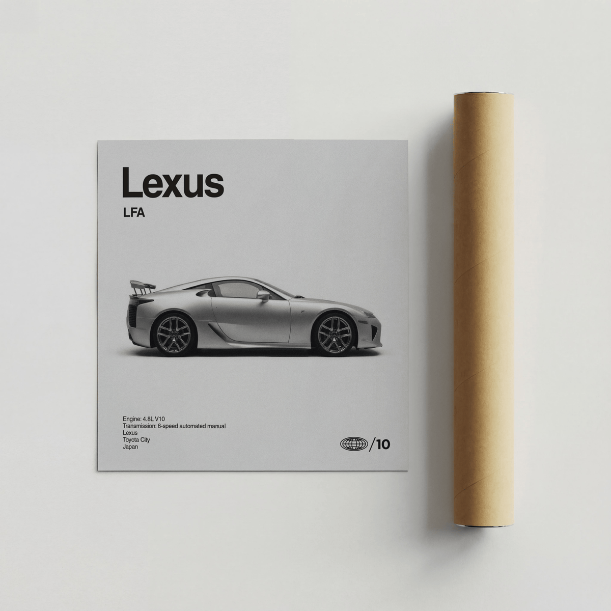 Japanese Supercar Poster next to a brown packaging tube on a white surface