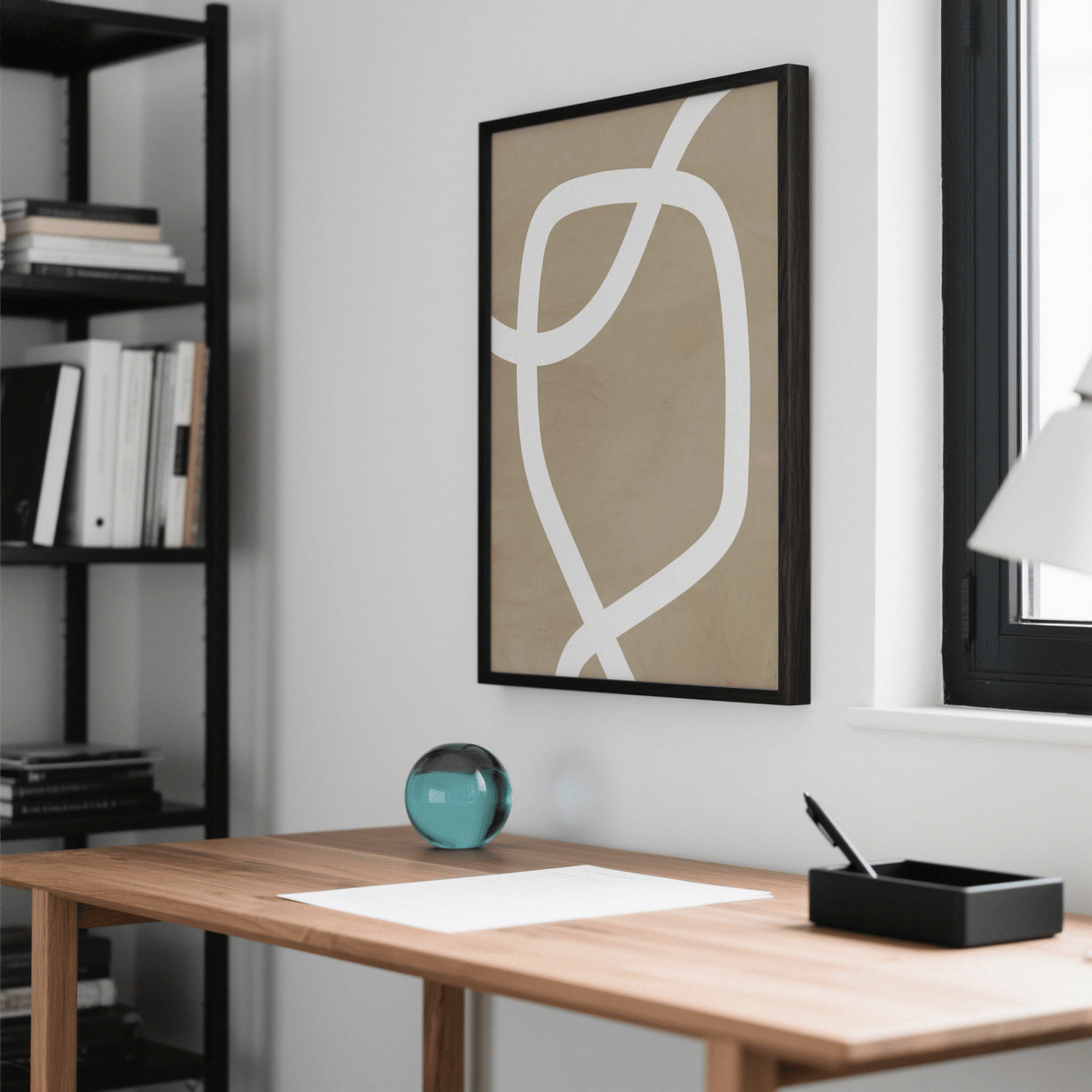 Minimalist Art Wall print with curved white lines on beige background above desk with glass orb