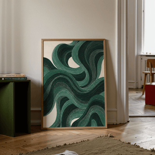 Modern Swirl Poster leaning on a wooden floor next to a small shelf with books in a softly lit room