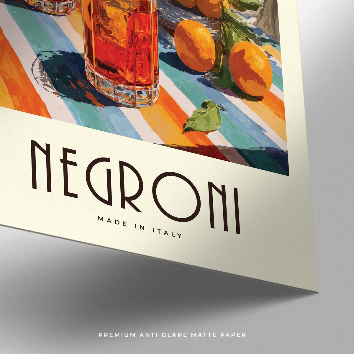 Detail close-up of Negroni Amalfi illustration showing text and part of orange peel on striped table