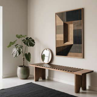 Abstract Geometric Wall Art print with beige and dark blocks above a wooden bench and round mirror in a minimal hall