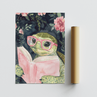Turtle Reading Art Print with watercolour turtle wearing pink glasses holding a pink book alongside a packaging tube