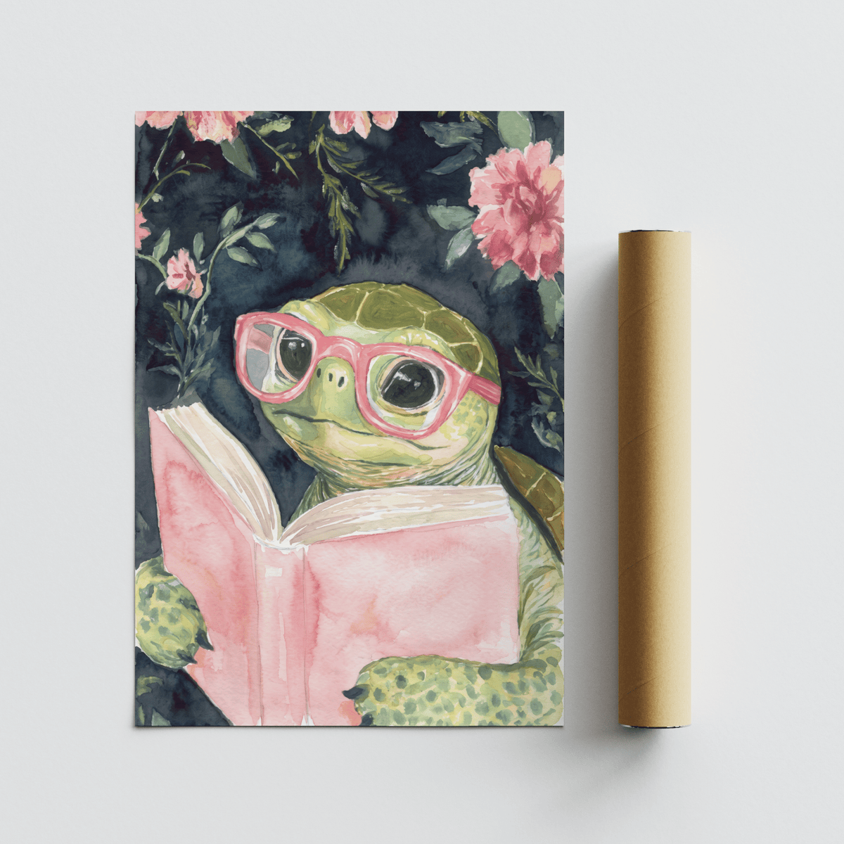 Turtle Reading Art Print with watercolour turtle wearing pink glasses holding a pink book alongside a packaging tube