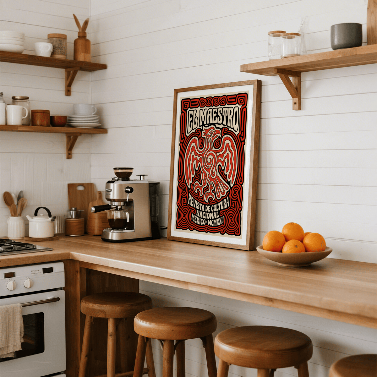 Cultural Mexican Poster print leaning on a kitchen counter with a bowl of oranges and wooden stools
