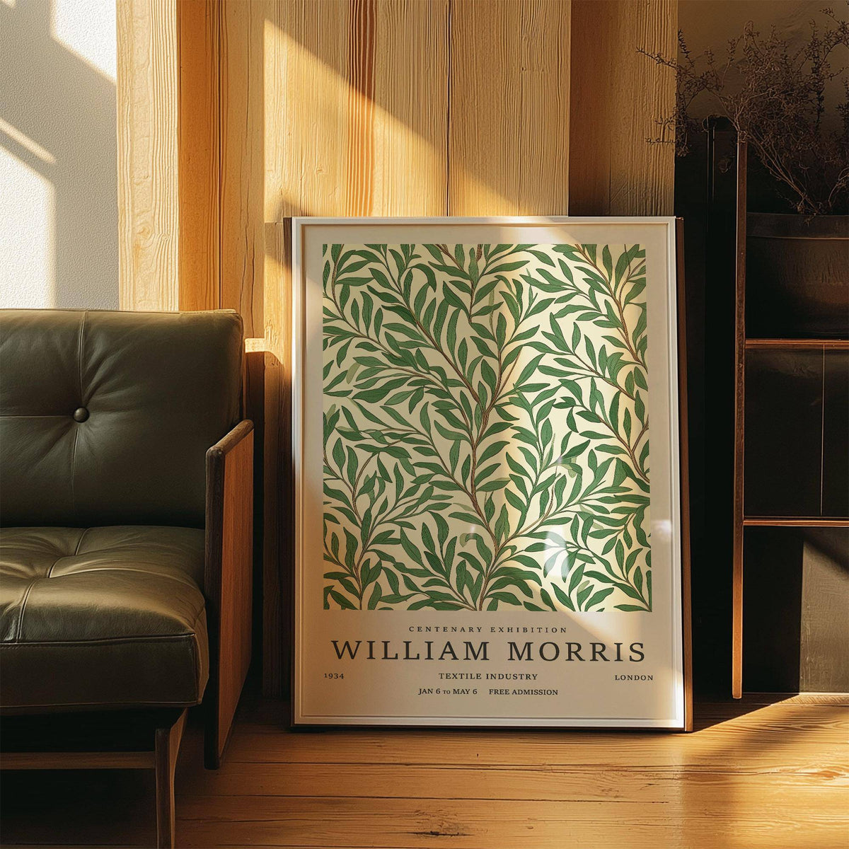 Classic Art Posters print of willow branches with green leaves leaning by a leather armchair in wood-panelled room