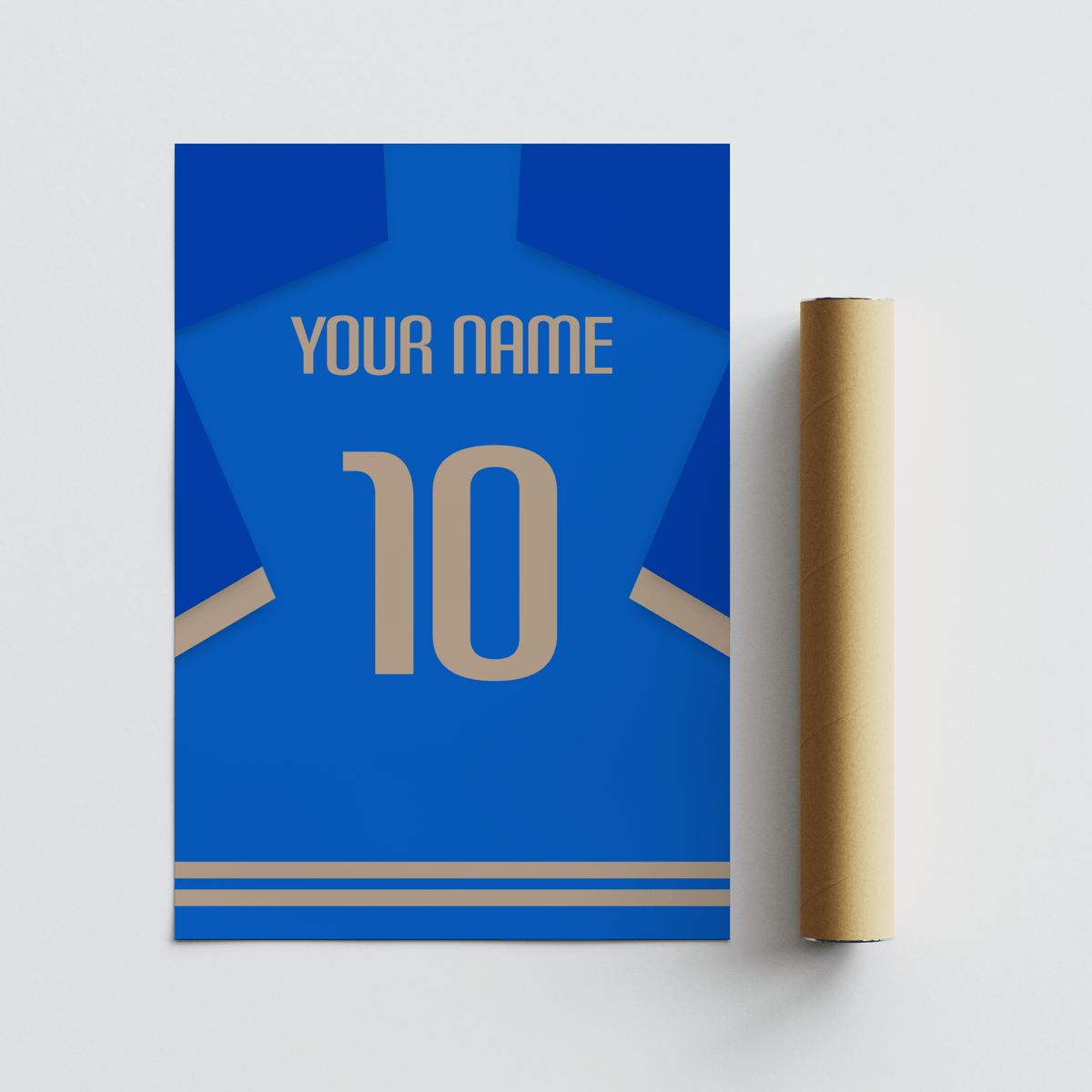 Rolled print beside a minimalist football shirt poster in blue with beige number on a white surface