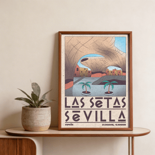 Framed Modern Sevilla wall art showing Las Setas with retro colours on a wood table with a plant
