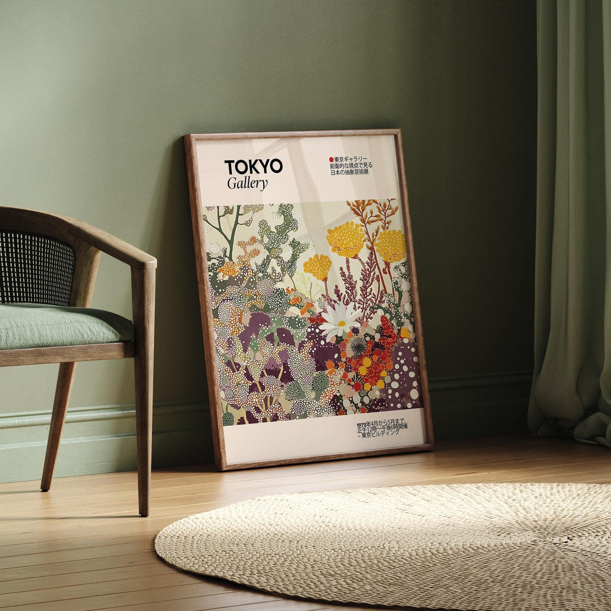 Print leaning on a floor by a wooden chair with abstract floral shapes in muted yellow and purple