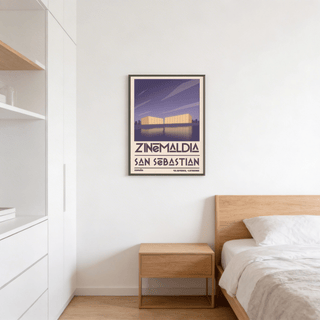 San Sebastian wall art showing minimalist conference centre buildings in purple and yellow above a wooden bedside table in a bedroom