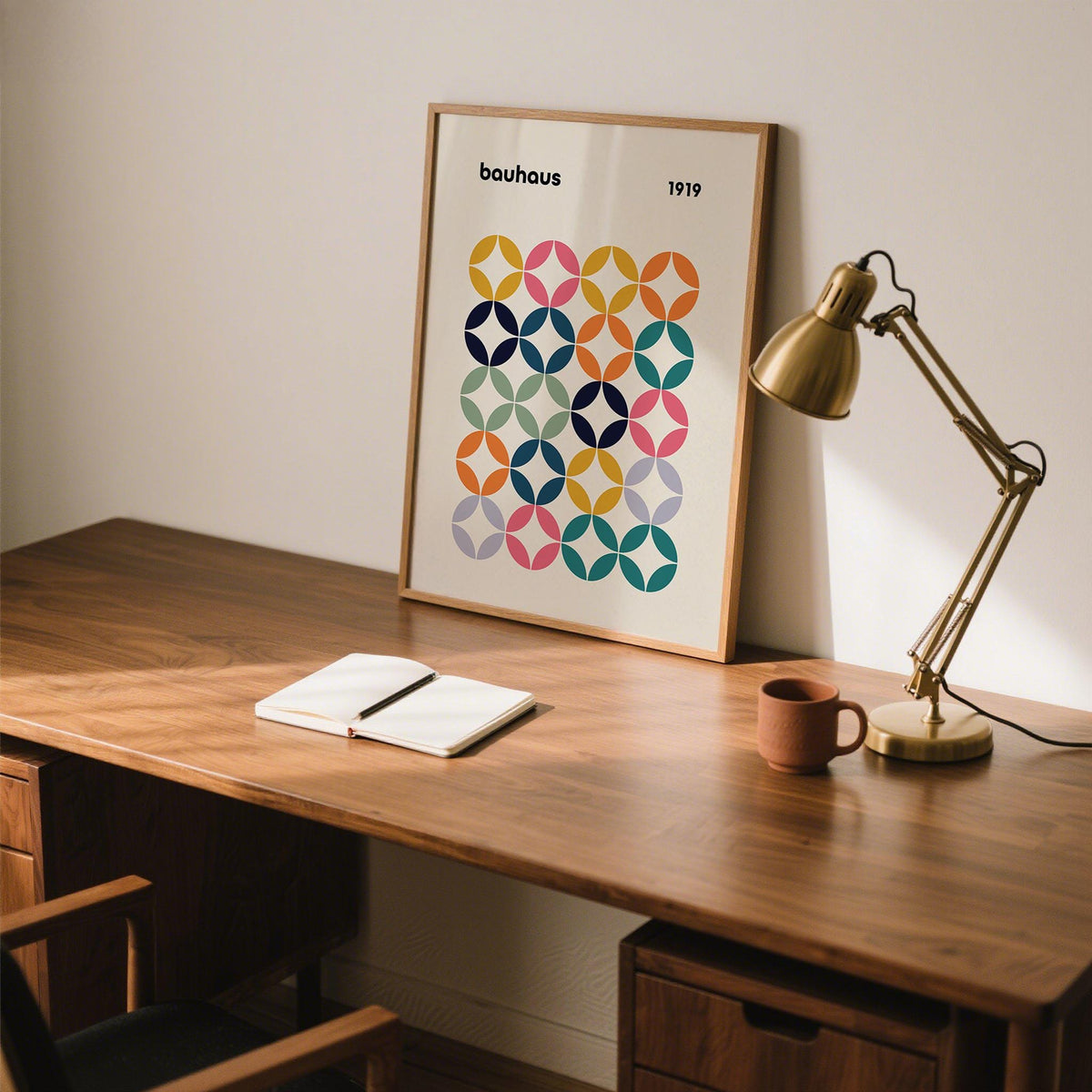 Colorful Wall Art Office with a minimalist bauhaus colour grid print on a desk with a lamp and cup