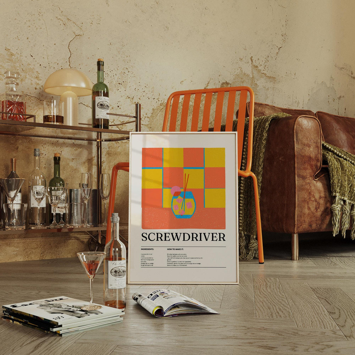 Screwdriver wall art print leaning on floor by a brown leather sofa and metal bar trolley