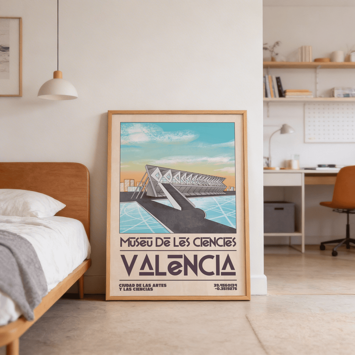 Print leaning on floor of Valencia Art Print with retro illustration in soft blues and oranges in a bedroom