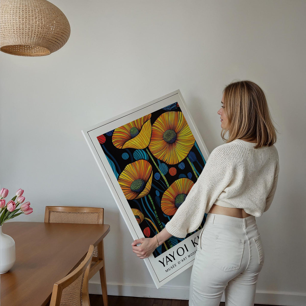 Framed Art of Poppies held by a woman showing yellow poppy flowers with blue and red details