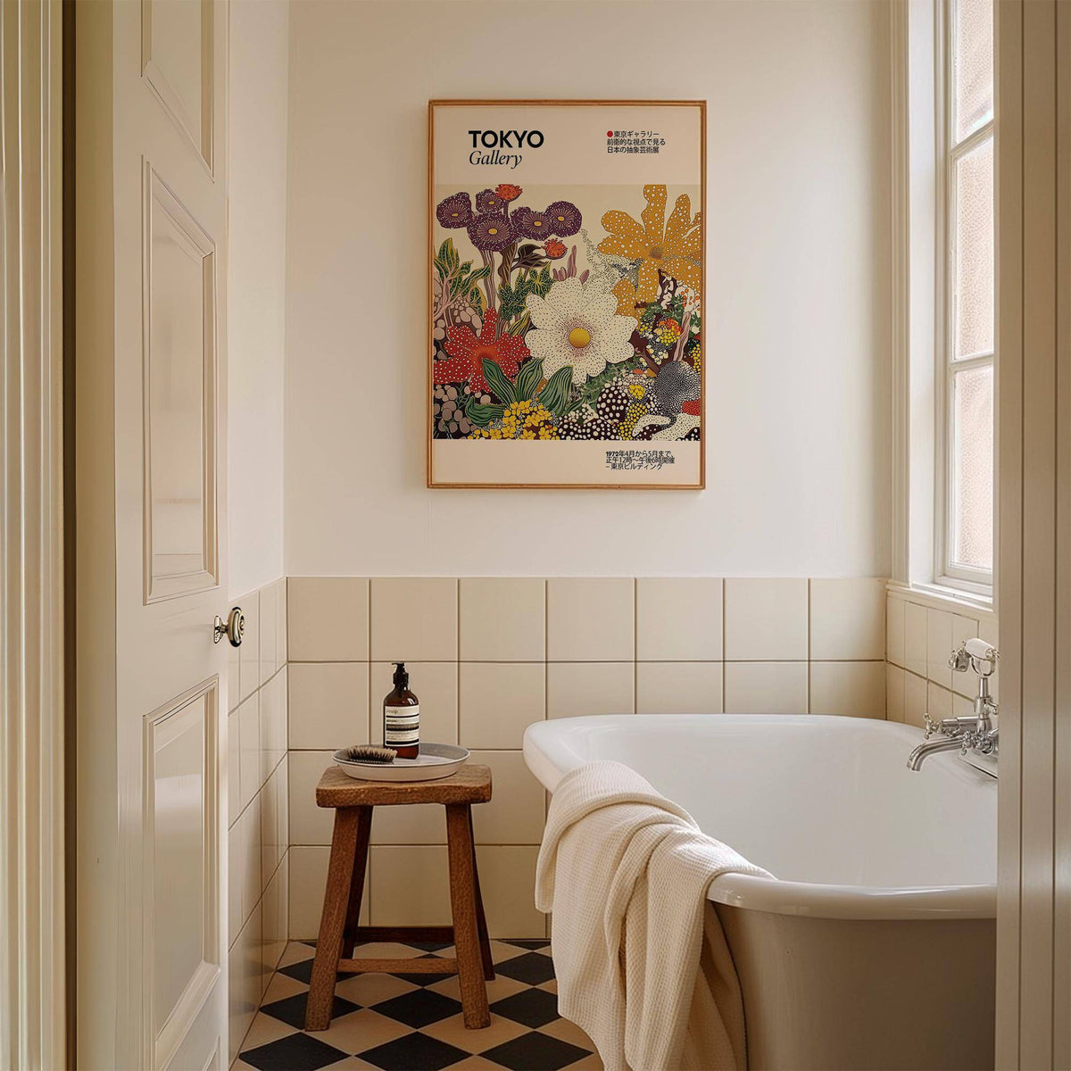 Japanese Flower Painting print of cosmos flowers in shades of white, orange and purple in a bathroom above a wooden stool