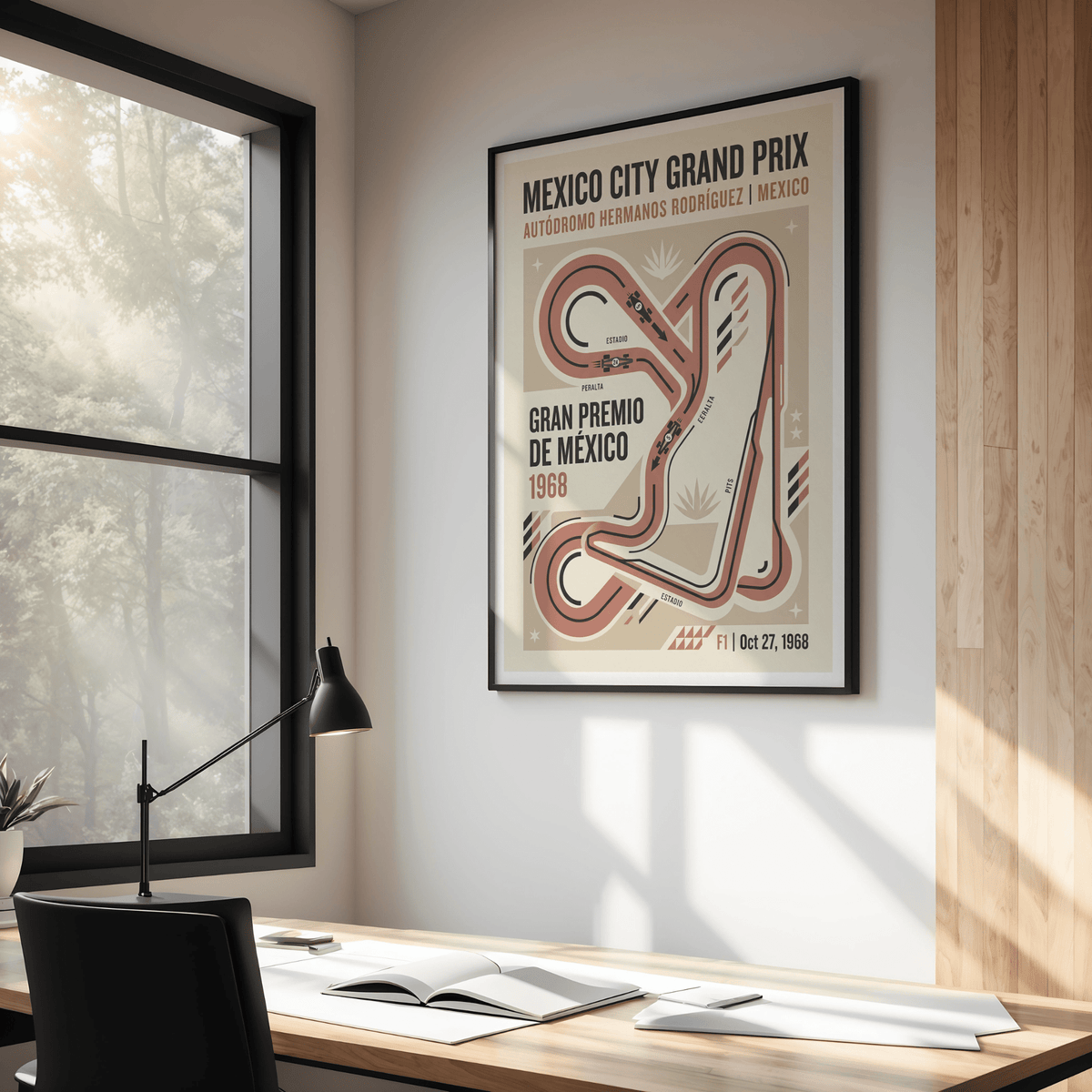 Print on a wall in a home office featuring a minimalist vintage race circuit map poster with beige and terracotta tones and a desk lamp