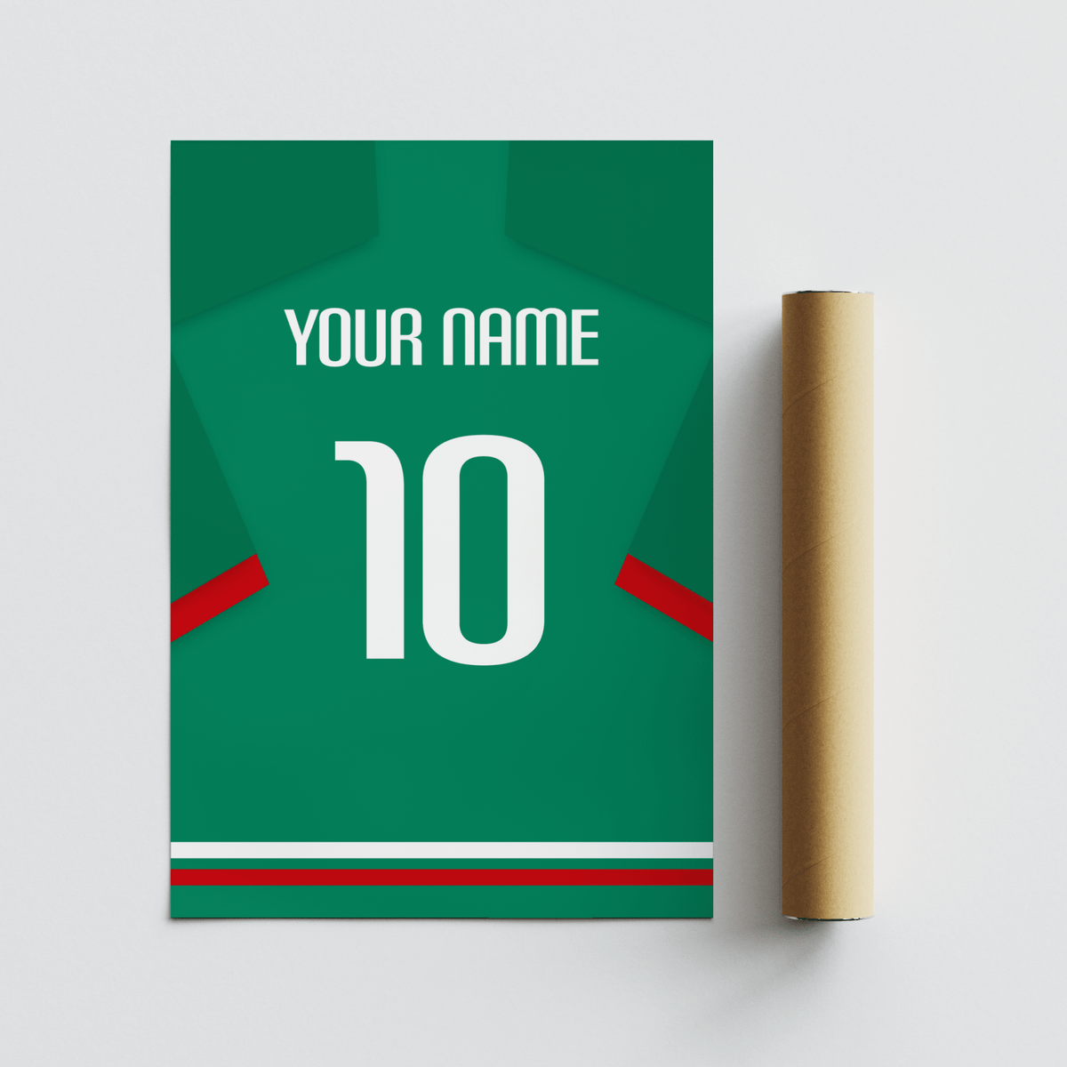 Rolled football shirt poster in green with red sleeve stripe beside a brown packaging tube