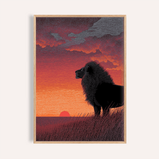 Framed print close-up of a black lion silhouette against a sunset with orange and grey hues
