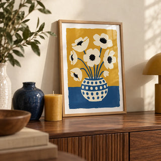 Flower Art Print, a small A4 framed print leaning on a walnut sideboard in a living room