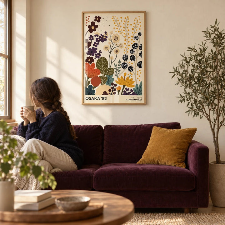 Flower Prints Art, framed on the wall of a warm living room with a plain cream plaster wall