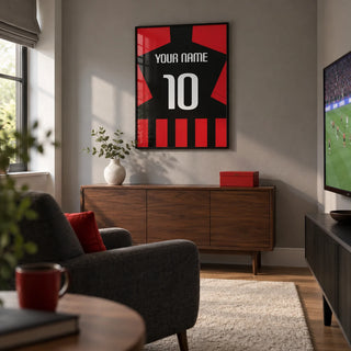 Football Shirt Poster in Black and Red Stripes, framed on the wall of a small football fan's snug in a UK family home with a muted grey wall in a living room