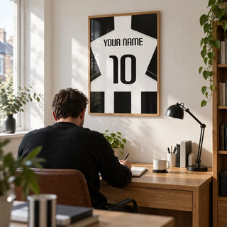 Football Shirt Poster in Black and White Stripes with Black Sleeves, framed on the wall of a bright home study for an adult football supporter in a UK terraced house