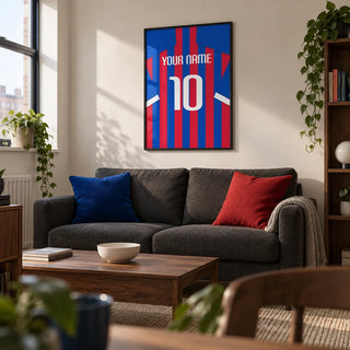 Football Shirt Poster in Blue and Red Stripes, framed on the wall of a compact modern living room in a young football fan’s first UK flat (22-28)