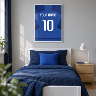 Football Shirt Poster in Blue with Dark Blue Sleeves and White Number, framed on the wall of a modern teenage football fan's single bedroom (13-17) in a UK family home with a pale grey wall and oak floor