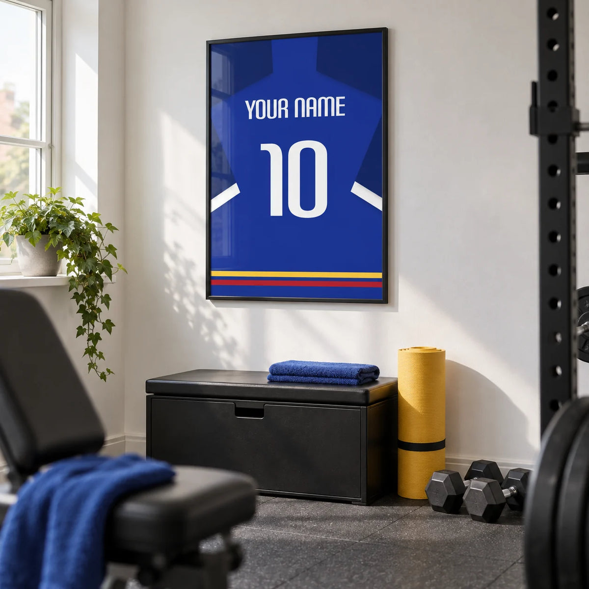 Football Shirt Poster in Blue with White Sleeve Stripe, framed on the wall of a modest converted spare-room home gym in a UK house with white walls and grey rubber flooring