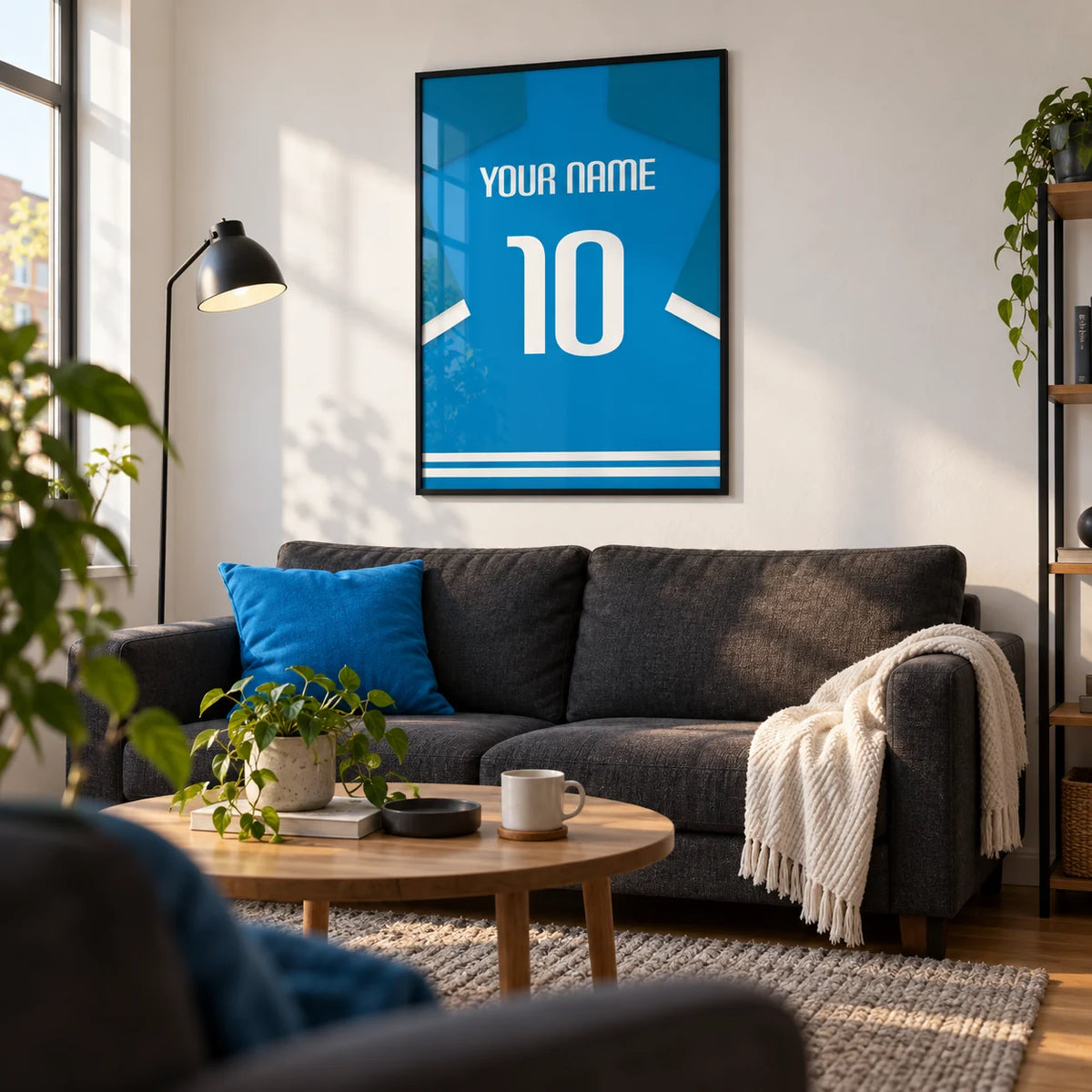 Football Shirt Poster in Bright Blue with White Number, framed on the wall of a crisp living room in a football fan's first flat (22-28)