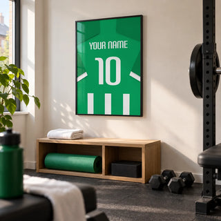 Football Shirt Poster in Green and White Stripes, framed on the wall of a compact home gym in a UK terraced house
