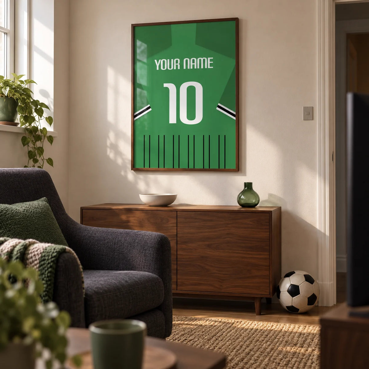 Football Shirt Poster in Green with Black and White Sleeve Stripes, framed on the wall of a compact football-watching snug in a UK terraced house in a living room