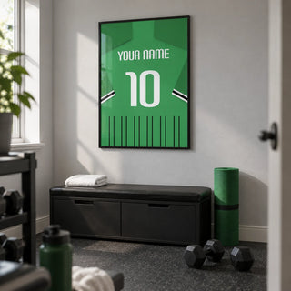 Football Shirt Poster in Green with Black and White Sleeve Stripes, framed on the wall of a modest home gym in a converted UK box room