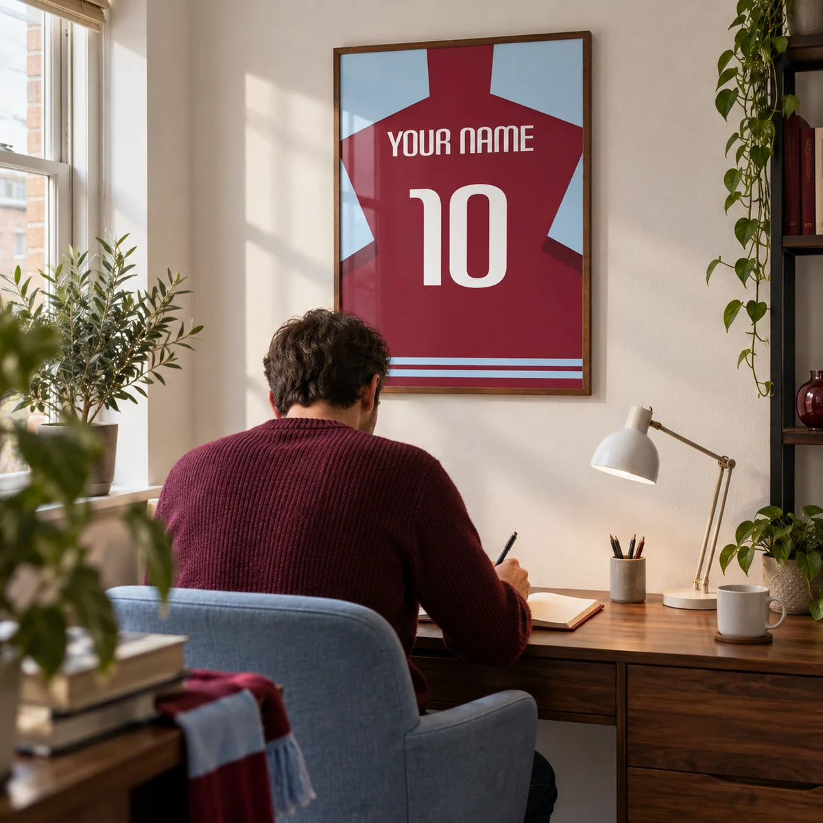 Football Shirt Poster in Plain Claret with White Number, framed on the wall of a compact home office for an adult football supporter in a UK terraced house with a soft white wall