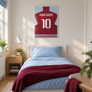 Football Shirt Poster in Plain Claret with White Number, framed on the wall of a modern football-loving teenager's single bedroom (13-17) in a UK family home with a warm white wall and oak floor