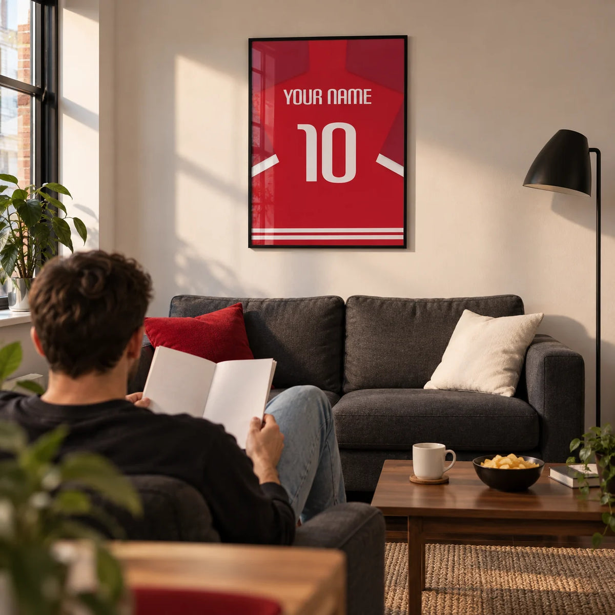 Football Shirt Poster in Red with Bold White 10, framed on the wall of a contemporary football-watching snug in a UK first flat (22-28) with a warm white wall and walnut floor in a living room