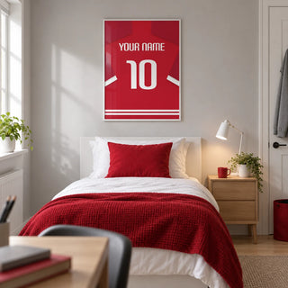 Football Shirt Poster in Red with Bold White 10, framed on the wall of a modern teenage football fan's single bedroom (13-17) in a UK family home with a pale grey wall and light oak floor