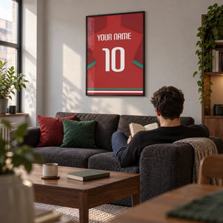 Football Shirt Poster in Red with Green Sleeve Stripe, framed on the wall of a modern living room in a football fan's first UK flat (22-28)