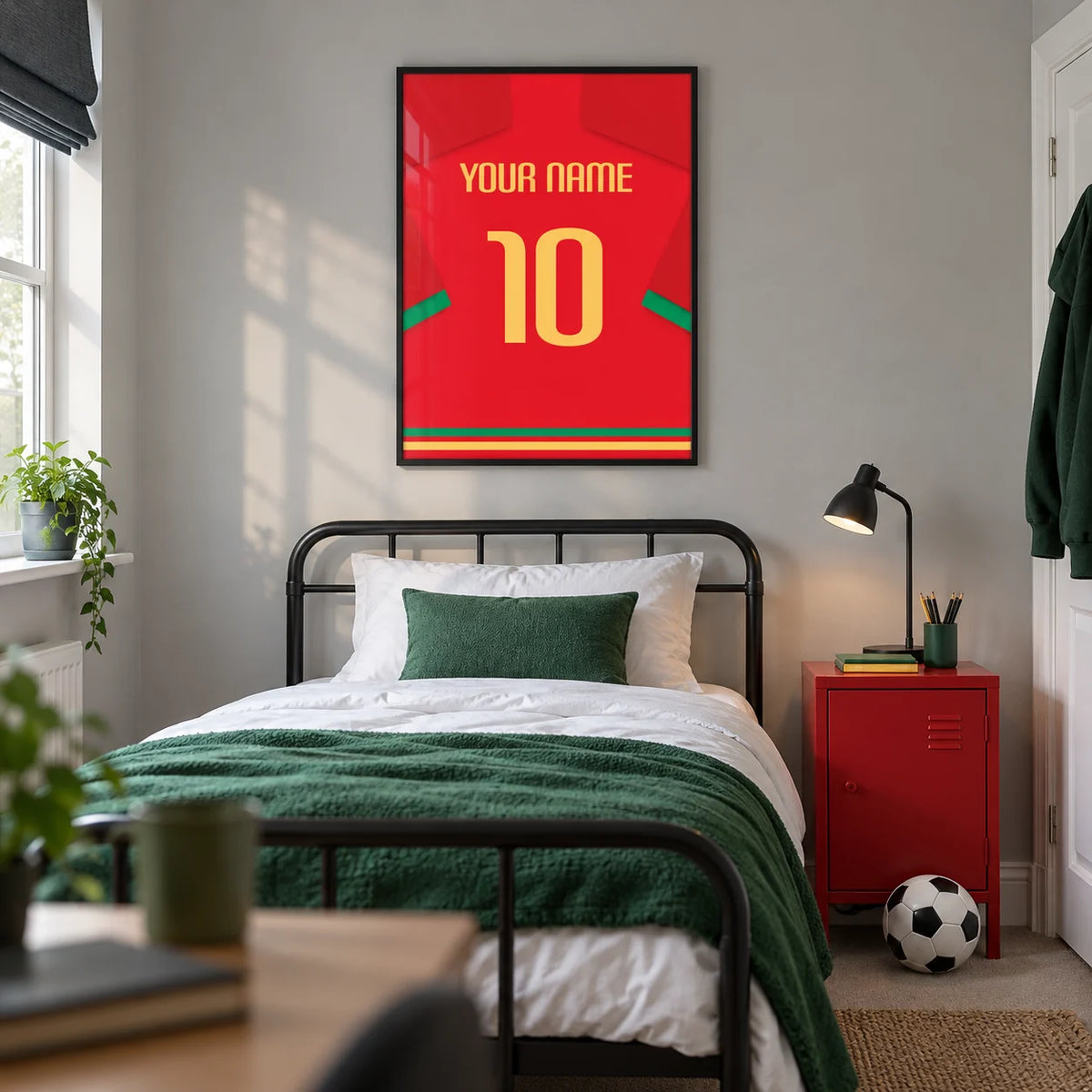 Football Shirt Poster in Red with Green Trim and Yellow Number, framed on the wall of a modern football-loving teenager's single bedroom (13-17) in a UK family home with a pale grey wall