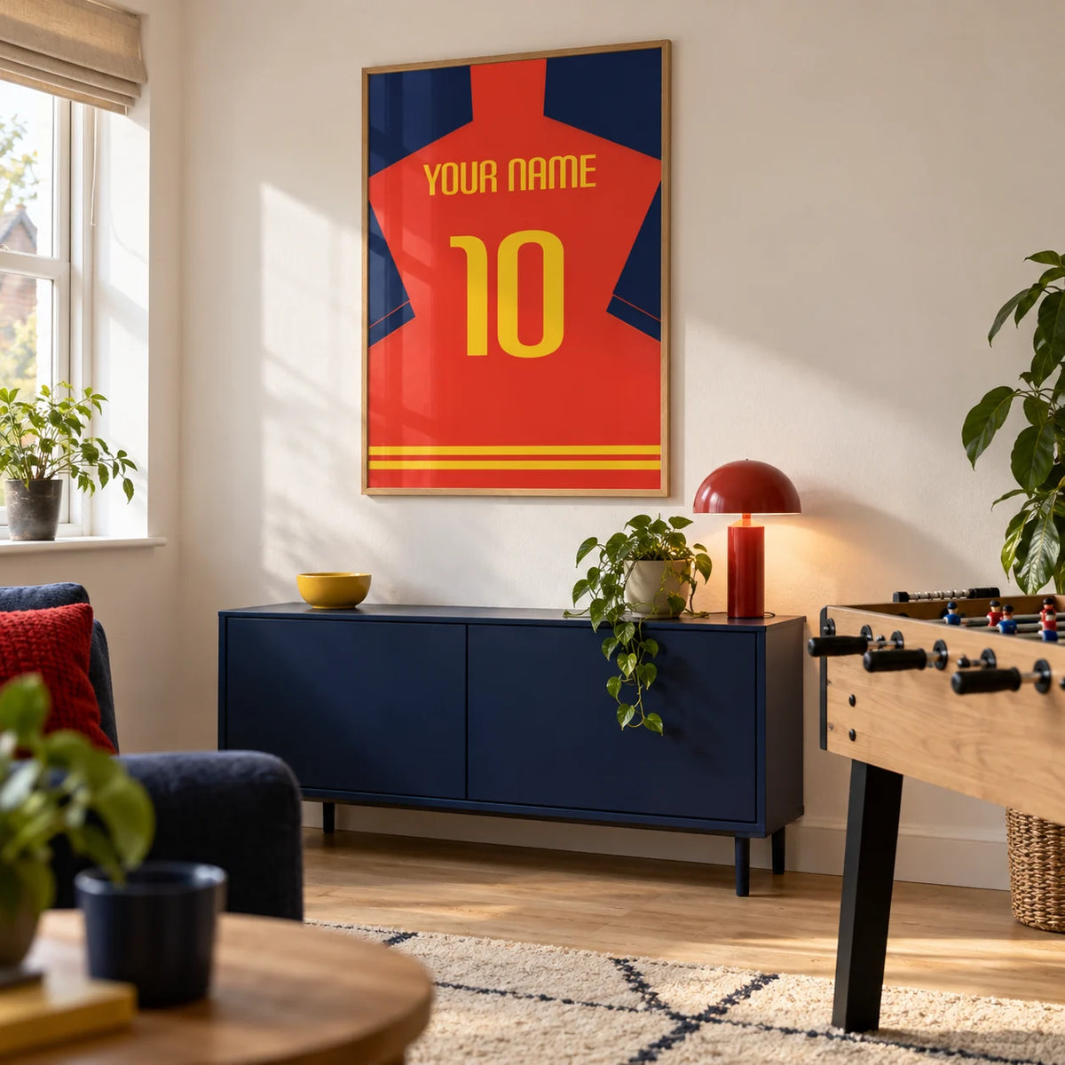 Football Shirt Poster in Red with Navy Sleeves and Yellow Number, framed on the wall of a modest football fan's games room in a UK family home