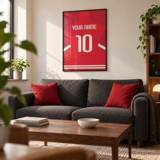 Football Shirt Poster in Red with White Number, framed on the wall of a compact football fan's living room in a first flat (22-28)