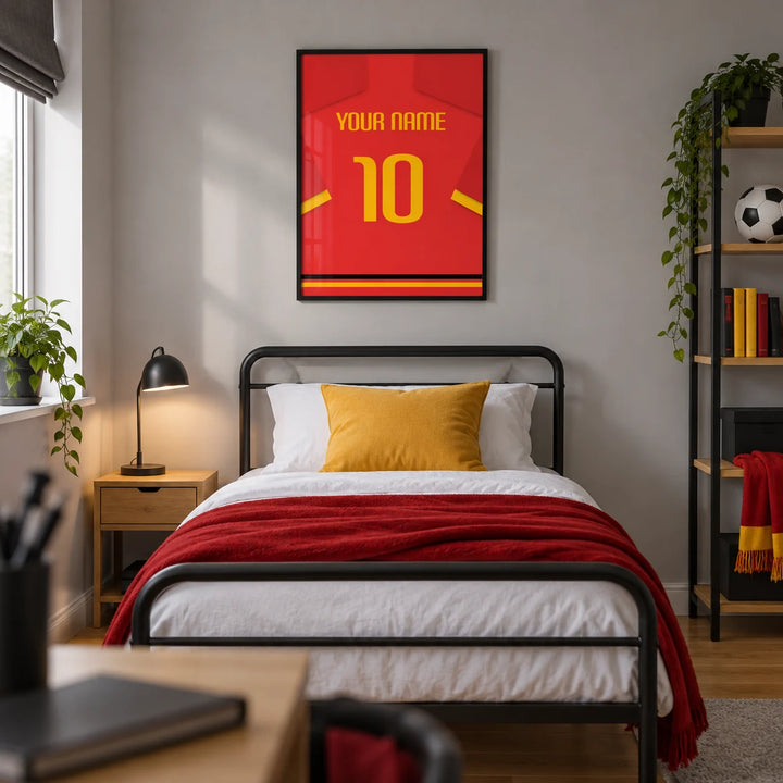 Football Shirt Poster in Red with Yellow Number and Sleeve Stripe, framed on the wall of a modern football-loving teenager's single bedroom (13-17) in a UK family home with pale grey walls and an oak floor