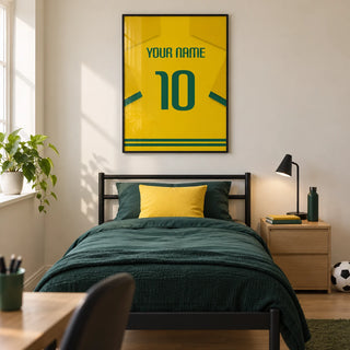 Football Shirt Poster in Yellow with Green Number, framed on the wall of a modern football-loving teenager's single bedroom (13-17) in a UK family home with a warm white wall and pale oak floor