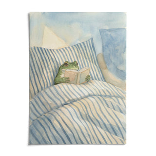 Frog Reading In Bed Print, shown as an unframed paper print on a plain white background
