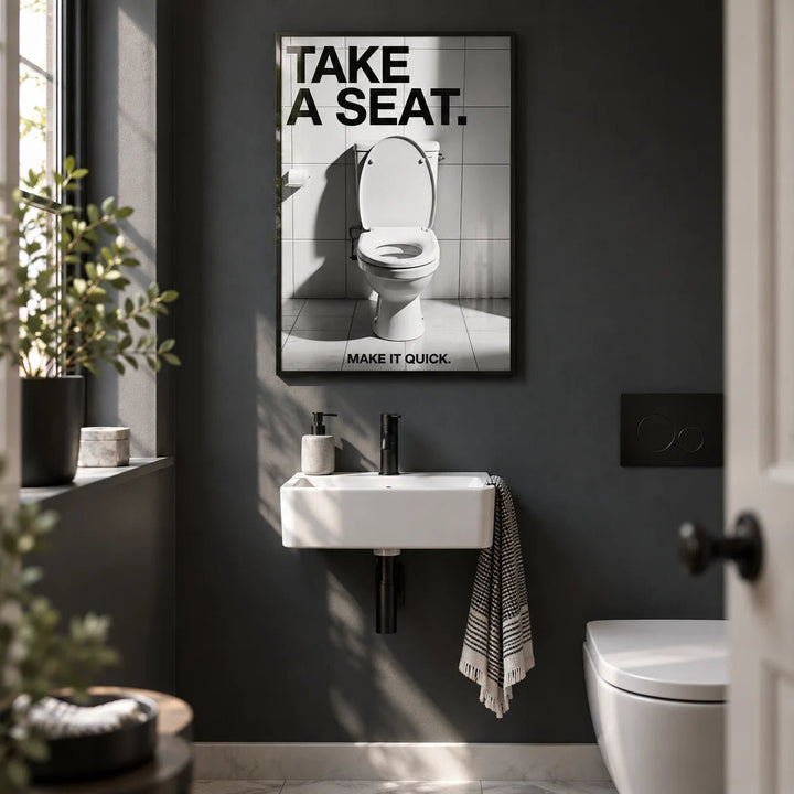 Funny Bathroom Art, framed on the wall of a modern downstairs cloakroom WC with a charcoal painted wall